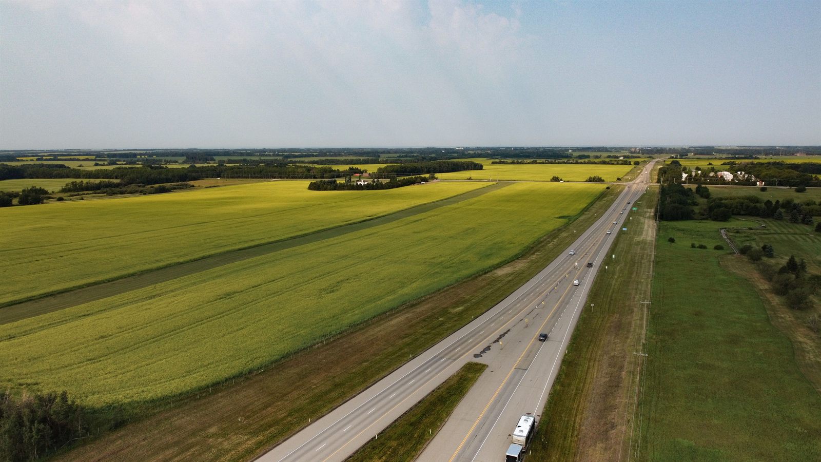 A highway running through Alberta farmland